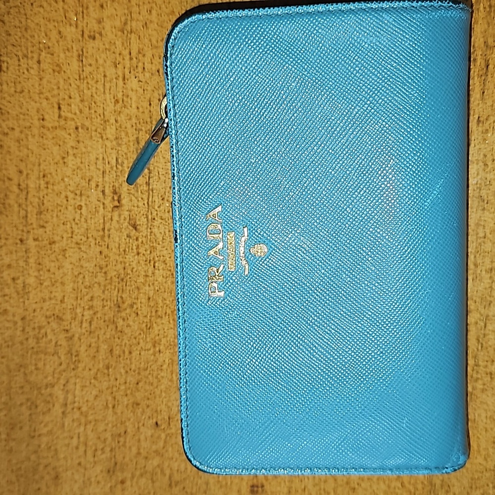 Prada zippy wallet, comes with the prada card